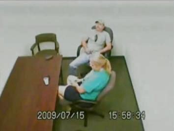 [Pam and Hugh Wiggins at Escambia County Sheriff's Office 07-15-09]