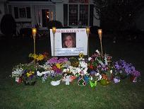 [Sharon Bychowski's 'Where is Stacy' sign and all the beautiful flowers for Stacy's Garden]