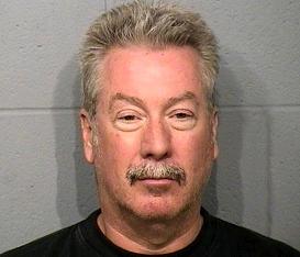 [Drew Peterson arrested 05/21/2008 on Felony gun charge - Bolingbrook, Illinois - Screen Capture from http://www.nbc5.com/slideshow/news/16352038/detail.html]