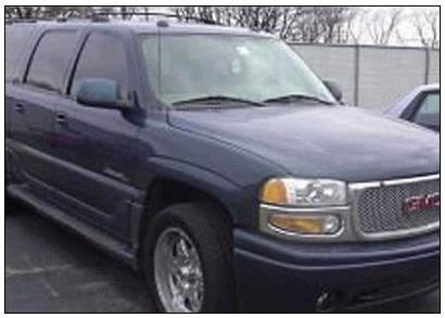 [Drew Peterson's car, 2005 GMC Dark Blue Yukon Denali SUV  - Photo found at http://www.suntimes.com]