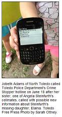 [Jobeth Adams of North Toledo holds her cellphone showing the call she and her husband made to Toledo Police Department's Crime Stoppers tip line on June 18th]